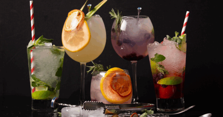 Colorful tequila cocktails with citrus and herbs, served in highball and stemmed glasses