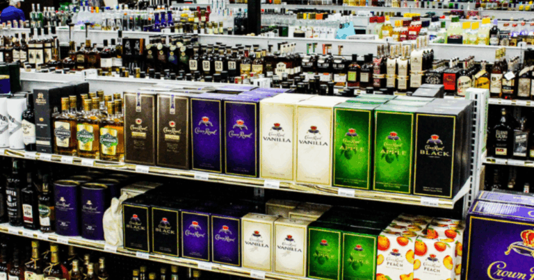 Interior of Pina Wine and Spirits showing wide liquor selection in Kansas City.