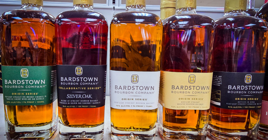 How the Pina Inner Circle Works: Your Path to Allocated Bourbon and Rare Finds 1 Bardstown Bourbon Company bottles lined up on a retail shelf at Pina Wine and Spirits, showcasing premium bourbon and whiskey options for Pina's Inner Circle members.