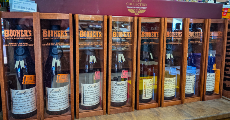 Liquor store aisle with craft beer coolers and seasonal beverage selections at a Missouri liquor store featuring seasonal specials and limited time drinks.