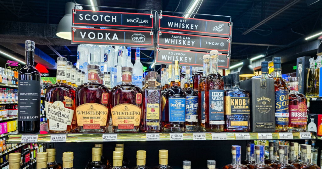 Premium spirits such as bourbon and whiskey bottles on display at a Missouri liquor store including small batch and single barrel selections at Pina Wine and Spirits.