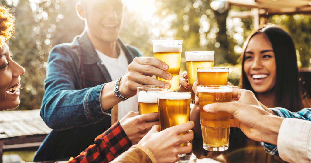 The Most Popular Local Beers at Pina Wine & Spirits According to Shoppers 1 Friends enjoying local beers in Kansas City for a backyard gathering with craft beer from Pina Wine & Spirits