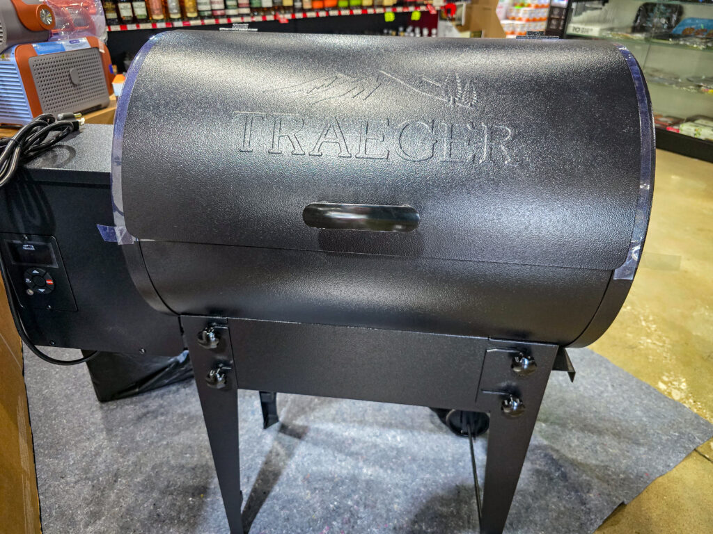 Traeger grill and smoker raffle prize displayed at Pina Wine & Spirits Odessa.